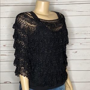 Area. A rayon crocheted layered top size S/M